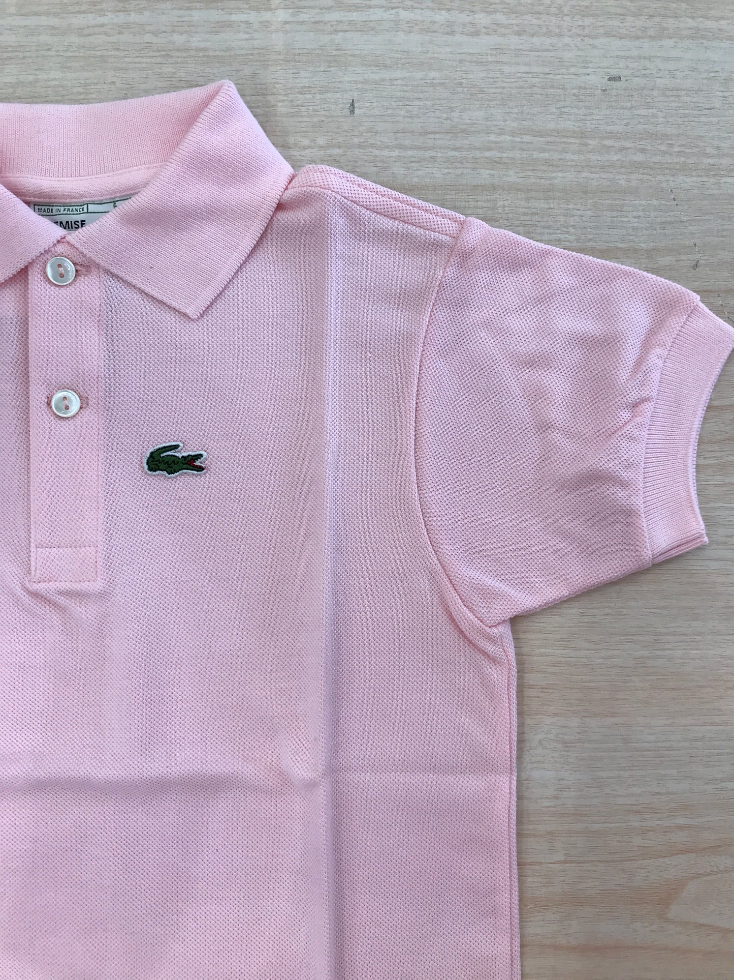 Polo Lacoste in cotone mezza manica con bottoncini e logo ricamato lateralmente unisex