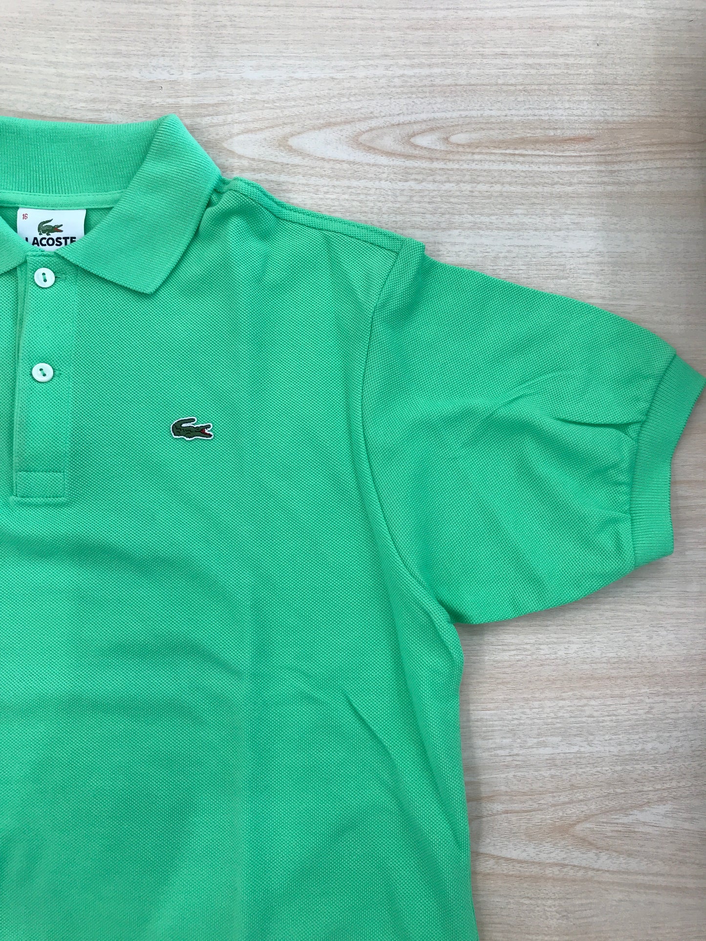 Polo Lacoste in cotone mezza manica con bottoncini e logo ricamato lateralmente unisex