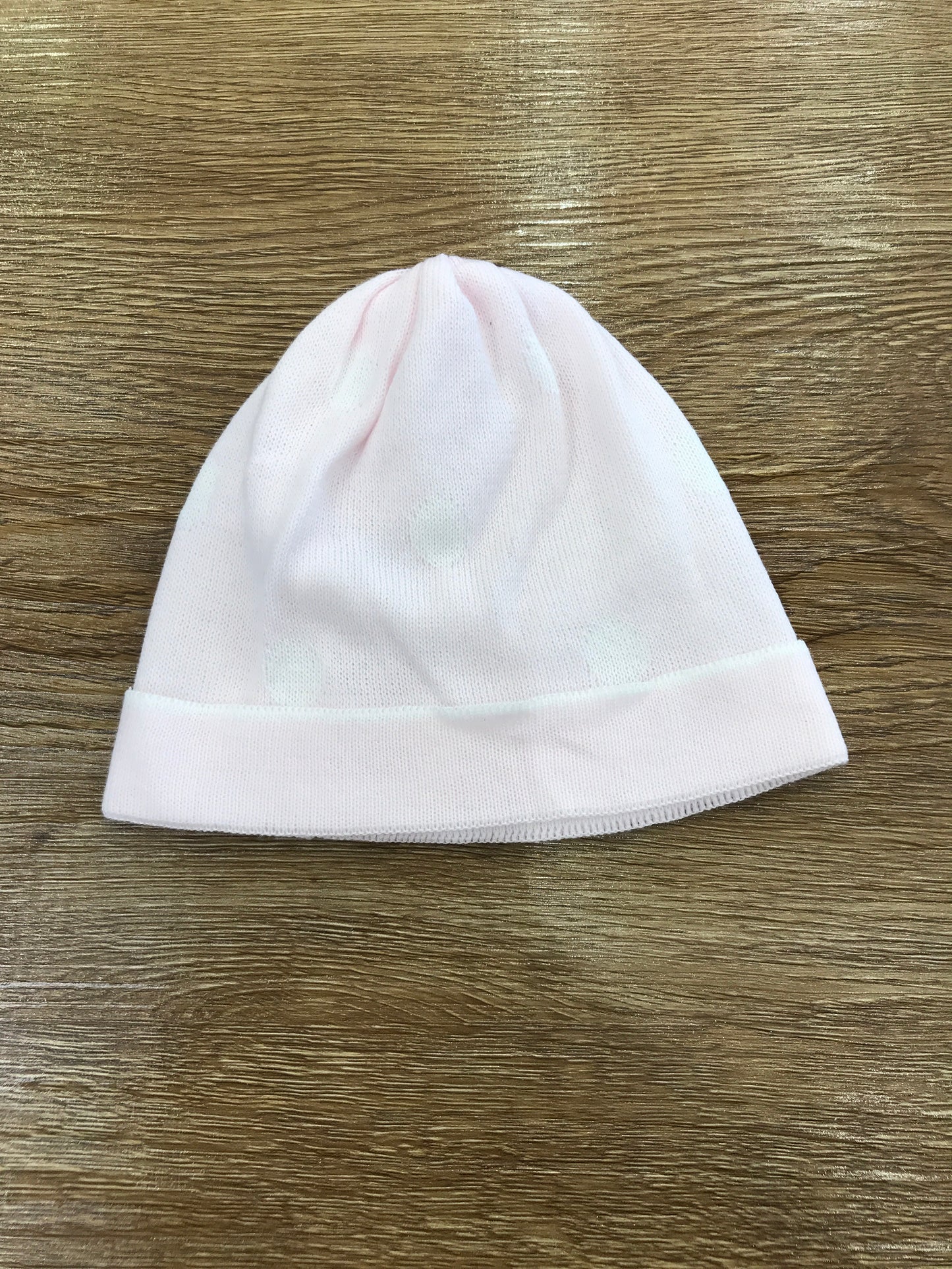 Cappello Baby Lord in filo rosa con risvolto e pois bianchi