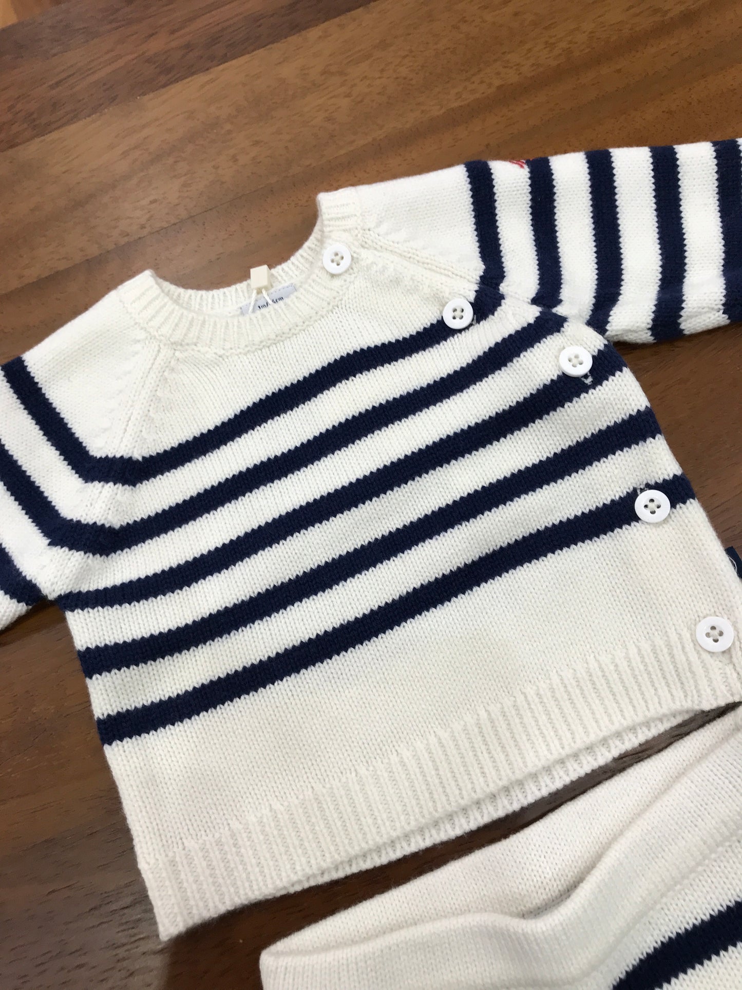 Completino Petit Bateau in lana panna a righe blu scuro con bottoncini laterali