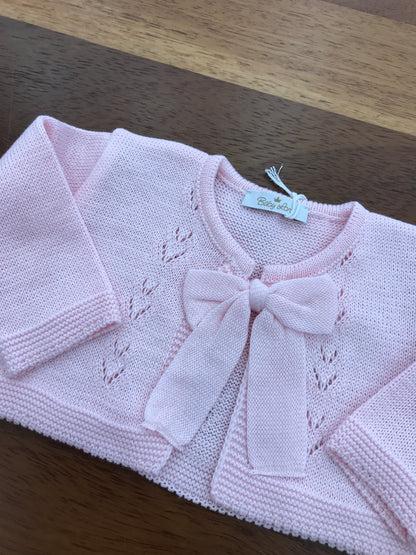Cardigan Baby Lord in filo rosa manica lunga con fiocco e lavorazione sul davanti