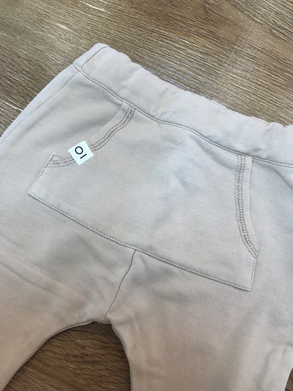 Pantalone Coccodè di tuta beige con tasca sul davanti ed elastico in vita
