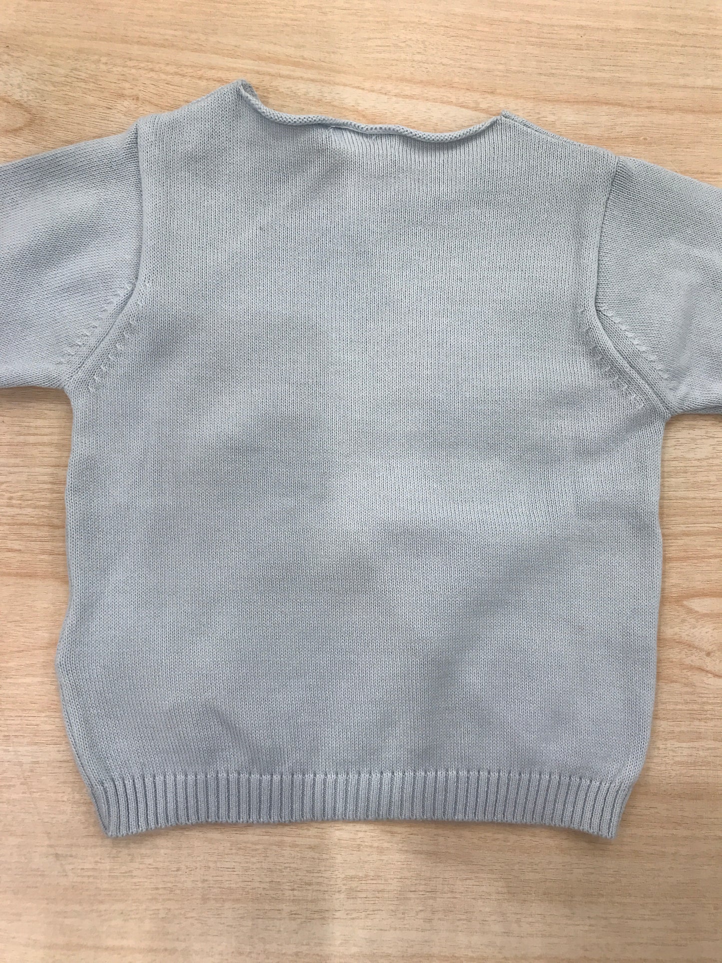 Maglione Nanan in filo manica lunga celeste con scritta centrale