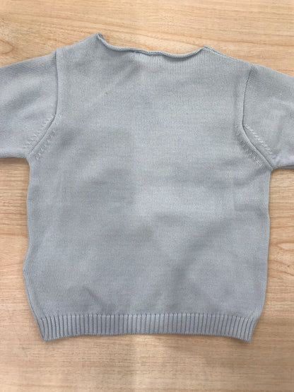 Maglione Nanan in filo manica lunga celeste con scritta centrale