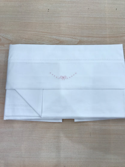 Lenzuola Baby Gi in cotone completo sotto con elastico sopra e federa rifinito con pois e fiocchetto rosa
