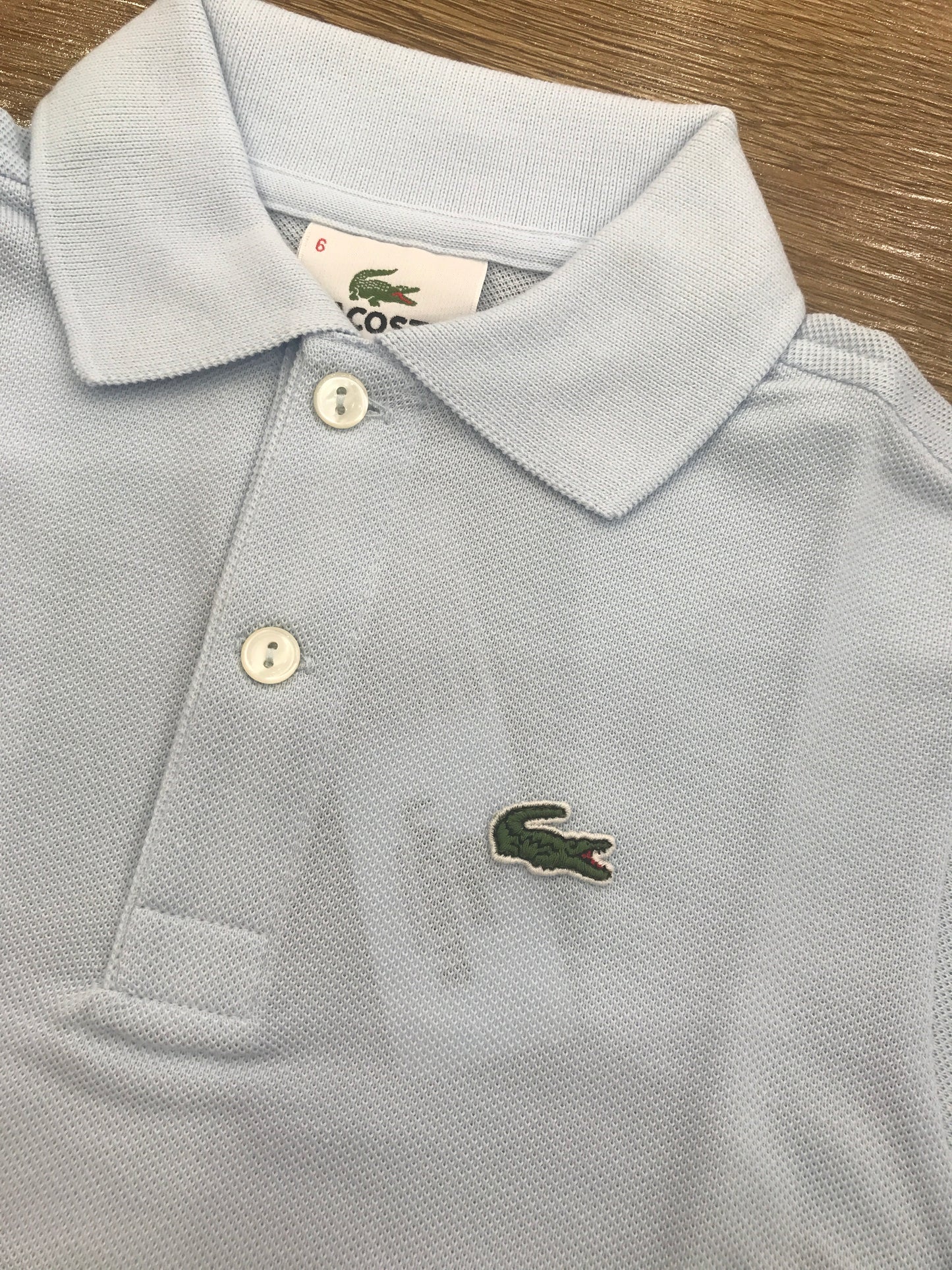 Polo Lacoste manica lunga con polsini e bottoncini