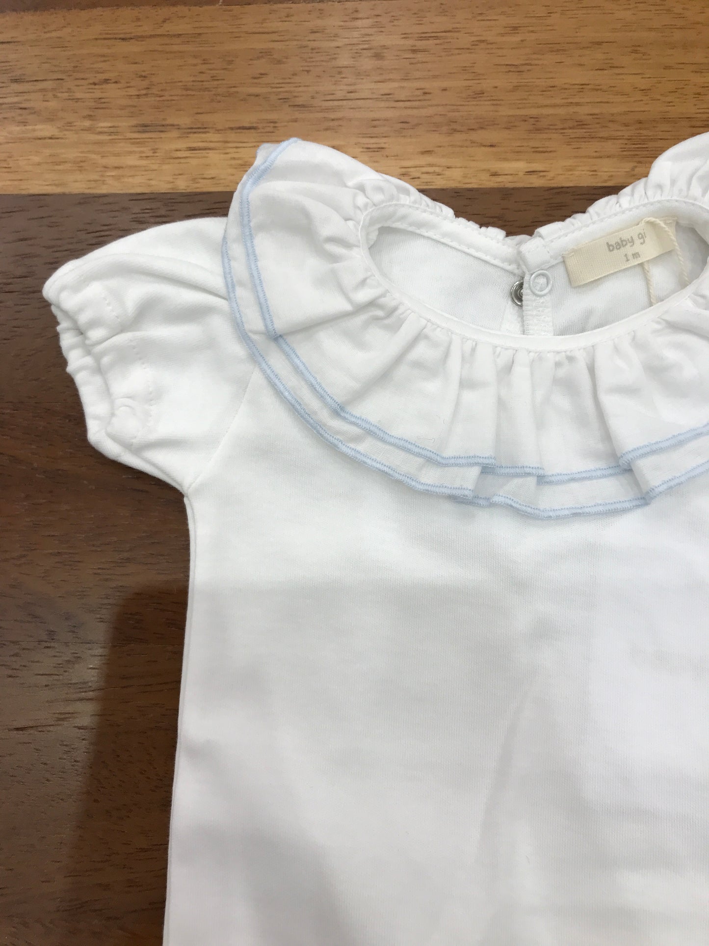 Body Baby Gi in cotone bianco mezza manica collo con rusche e bianca e celeste