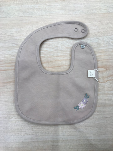 Bavetta Baby Gi in cotone rifinito in ciniglia rosa antico con fiore ricamato