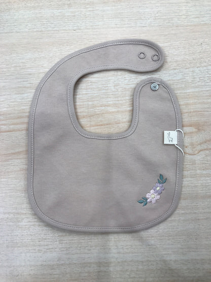 Bavetta Baby Gi in cotone rifinito in ciniglia rosa antico con fiore ricamato