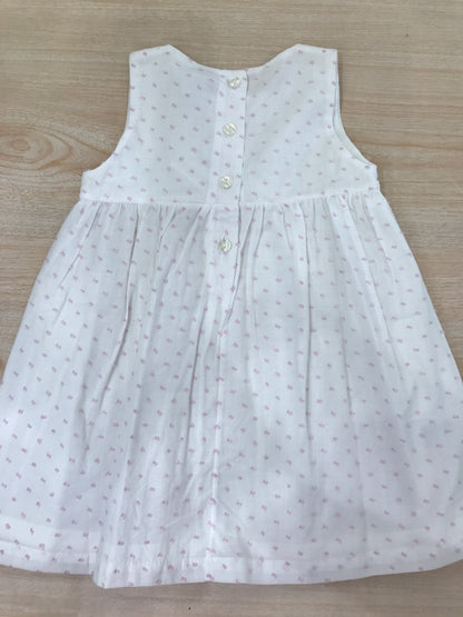 Abito Coccodè in cotone bianco con pois rosa smanicato con fiori in vita