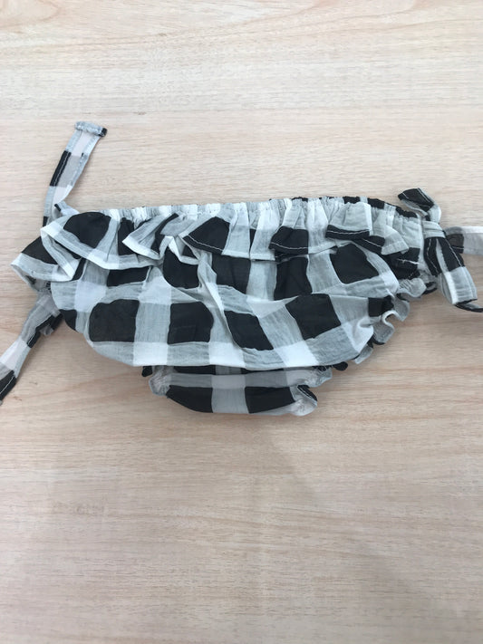 Costume Coccodè con rusche fiocchetti laterali a quadretti bianchi neri e grigi