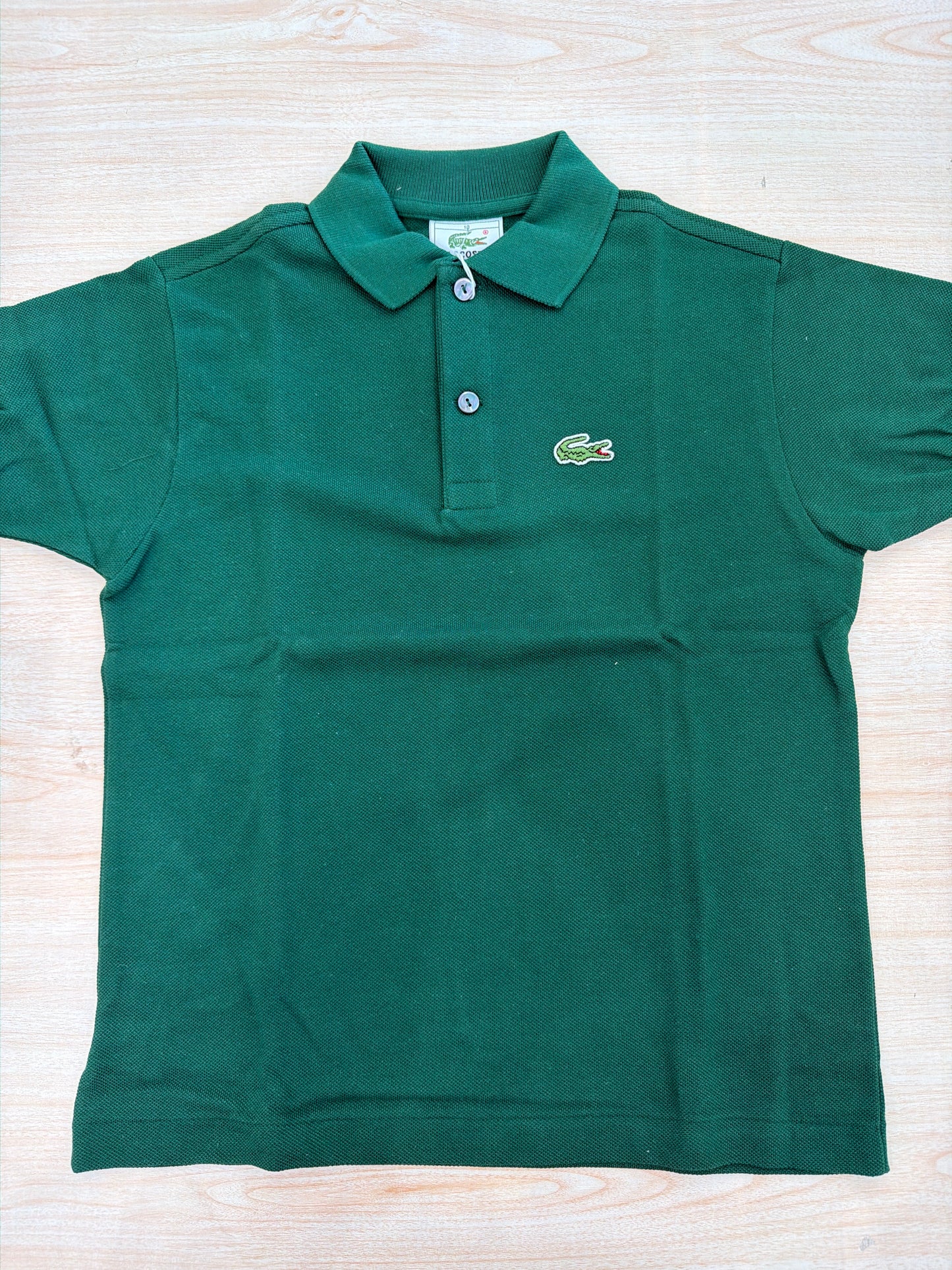 Polo Lacoste in cotone mezza manica con bottoncini e logo ricamato lateralmente unisex