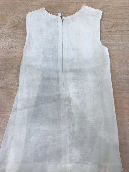 Abito Juppolà in lino bianco smanicato con rusche sul davanti e zip sul retro