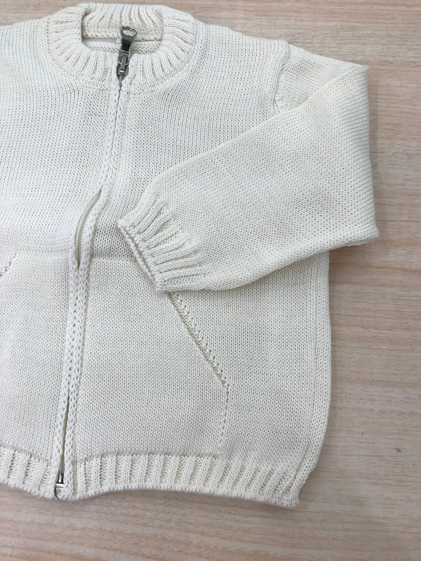 Cardigan Biebi in filo panna con zip manica lunga