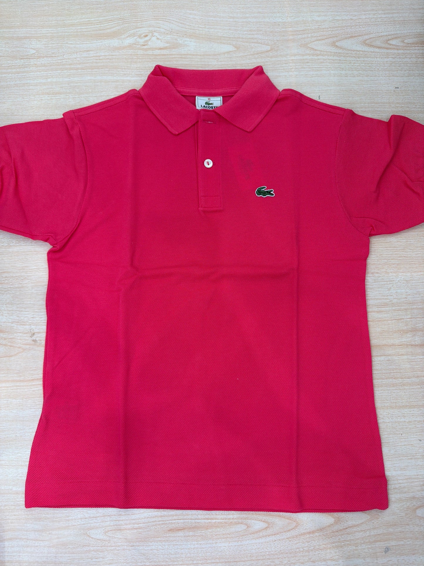 Polo Lacoste in cotone mezza manica con bottoncini e logo ricamato lateralmente unisex