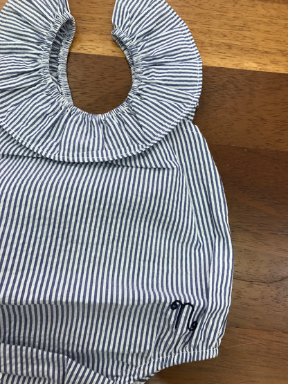 Pagliaccetto Nanan in cotone bianco e blu a righe smanicato con fiocco blu sul retro