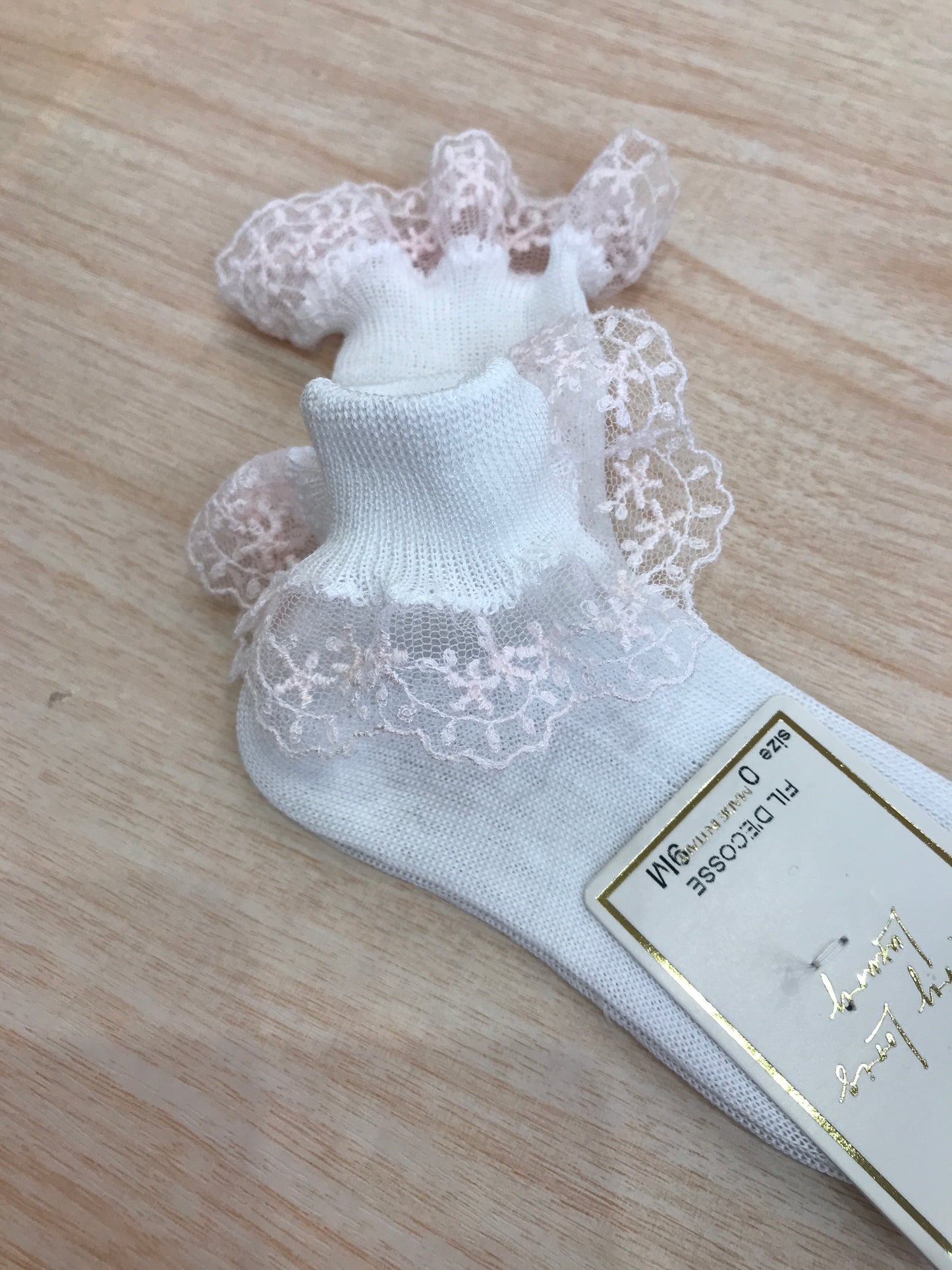 Calzino Story Loris in filo bianco con rusche rosa sul bordo